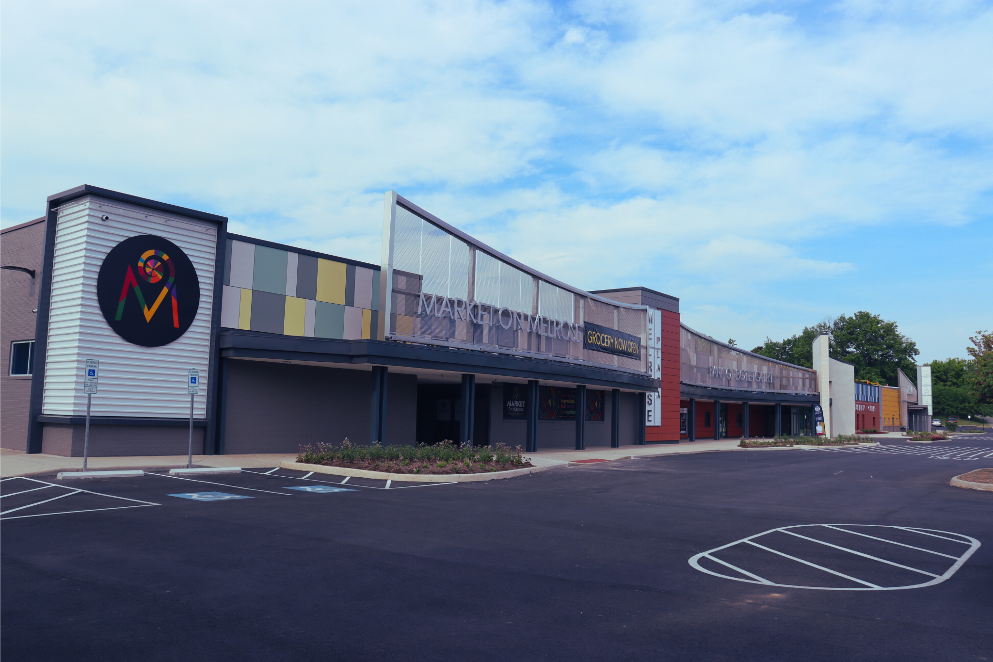 Front of Melrose Plaza building, showcasing Melrose Plaza logo